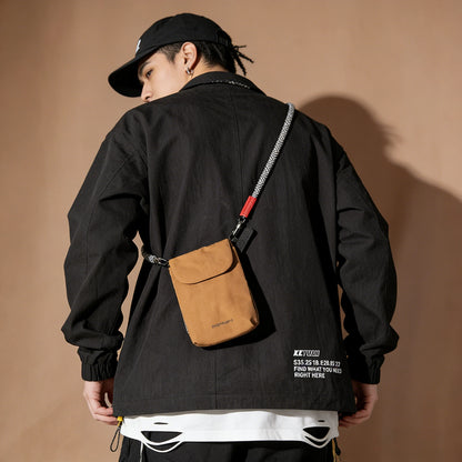 Anti-theft crossbody bag worn across shoulder